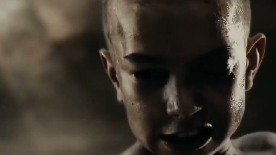 A young Spartan boy in the dust